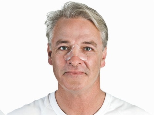 Man wearing a nose pad.