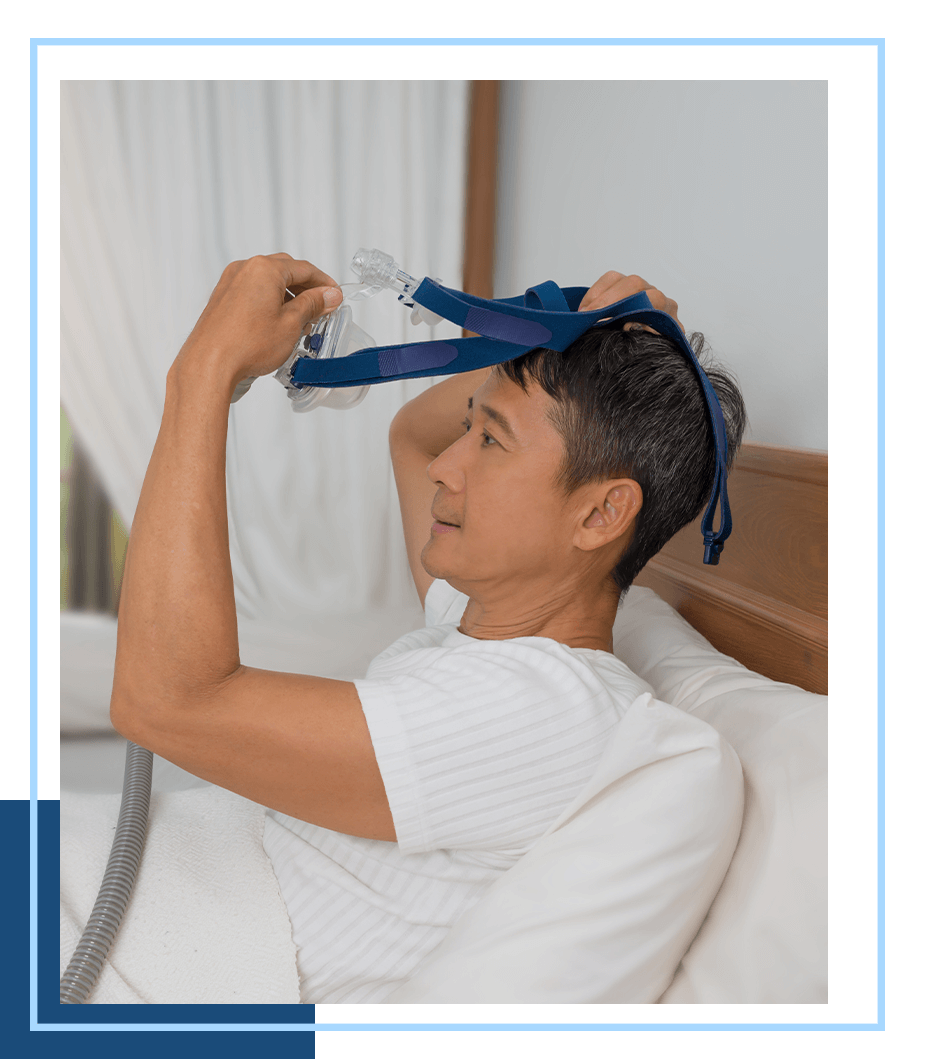 image of someone using a sleep apnia machine