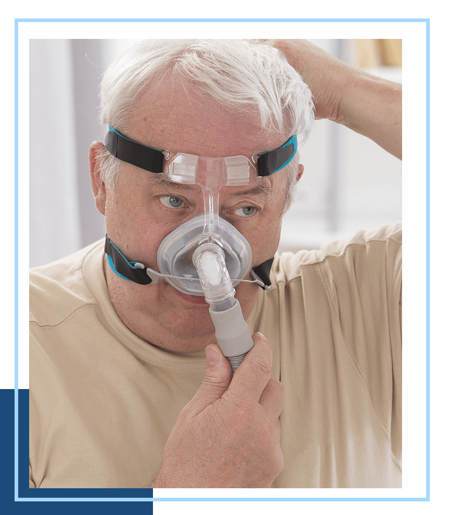 image of someone using a sleep apnia machine