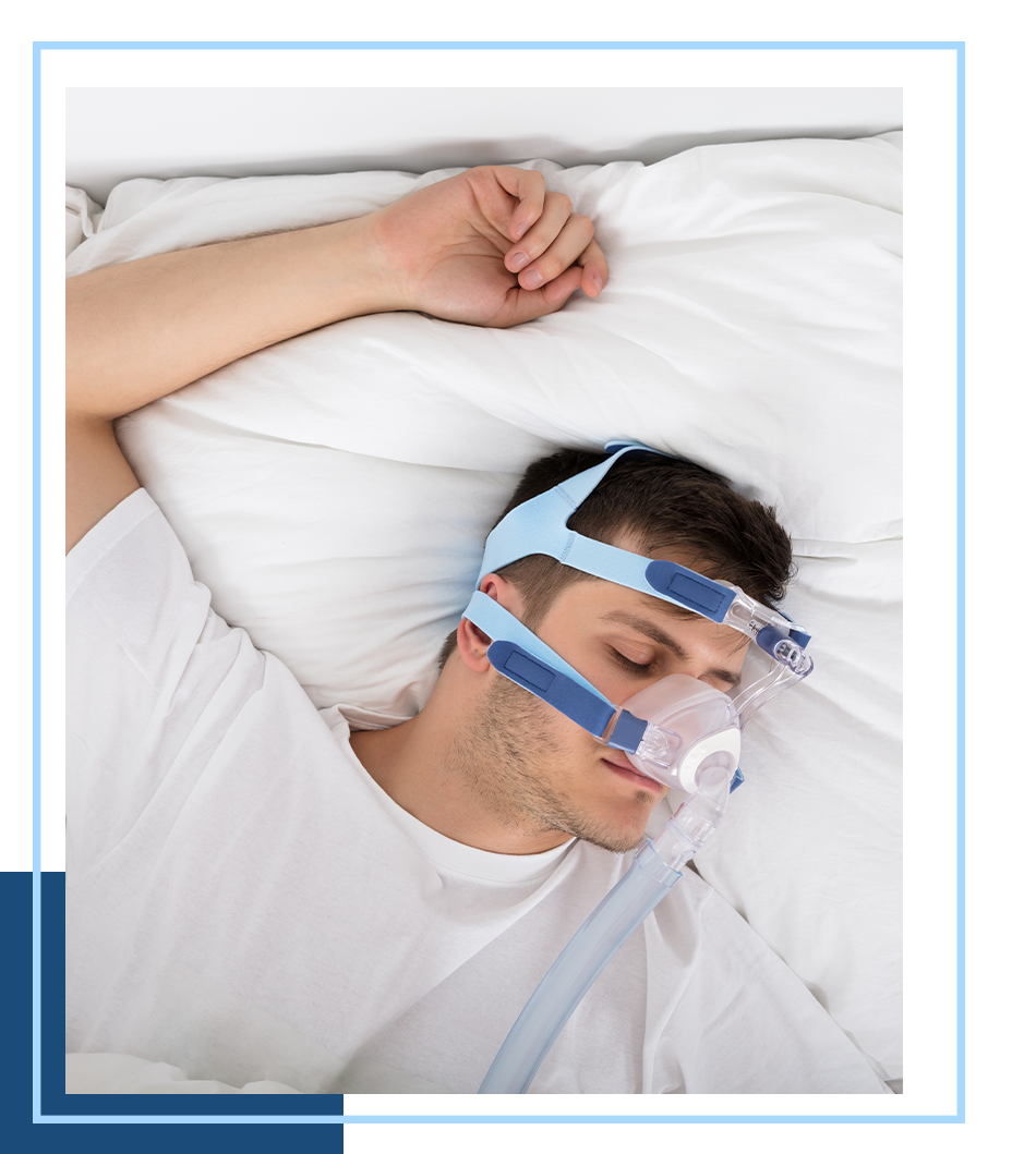 image of someone using a sleep apnia machine