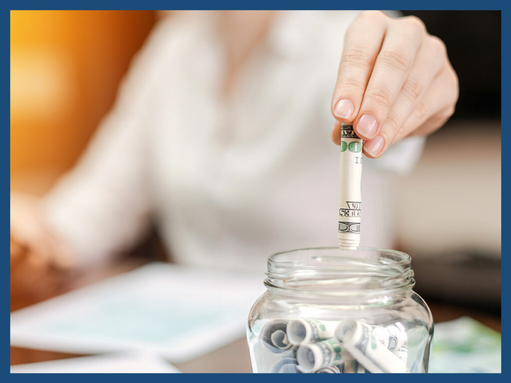 image of a woman saving money