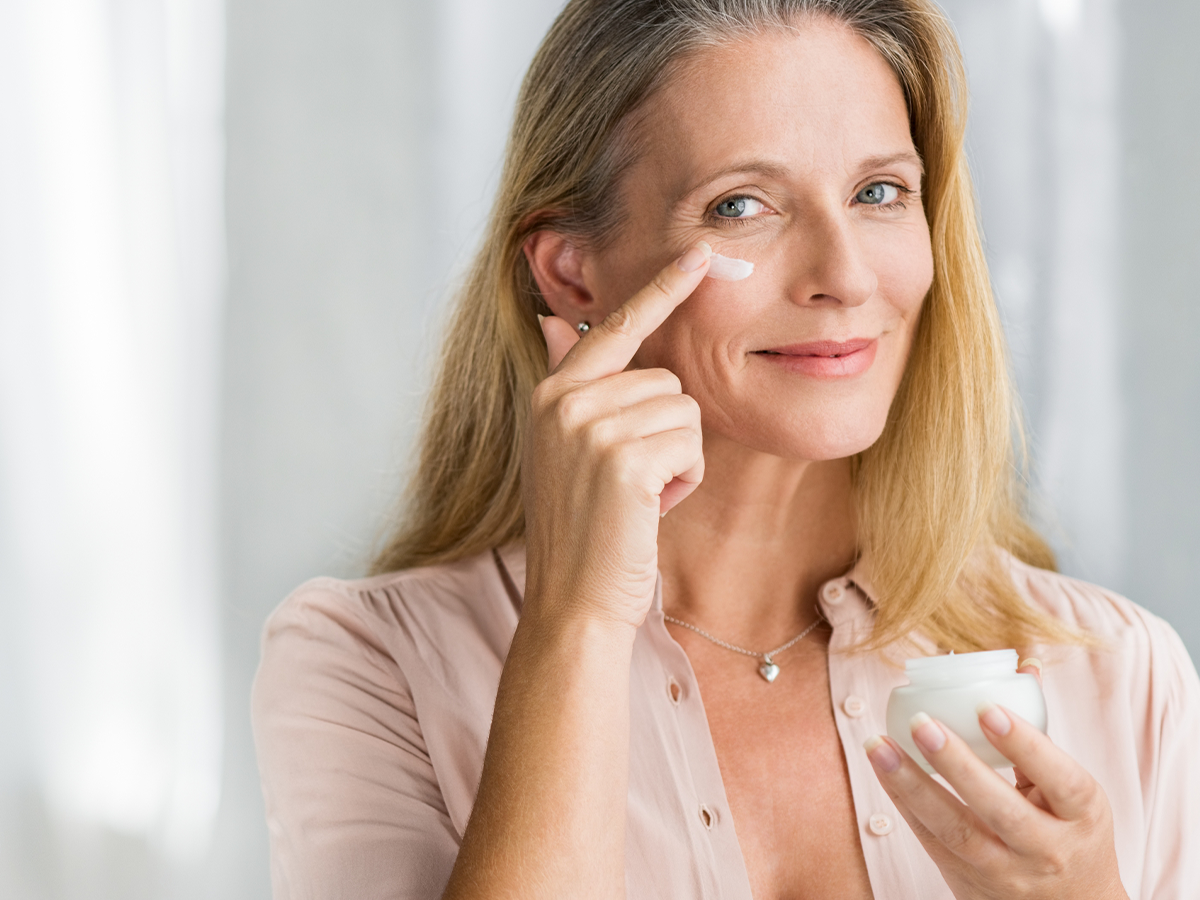 someone using face cream