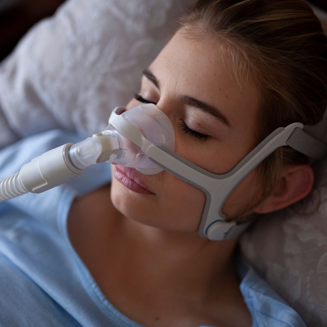 a woman using sleeping machine