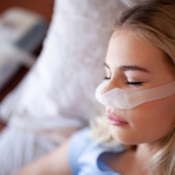 woman wearing cpap machine