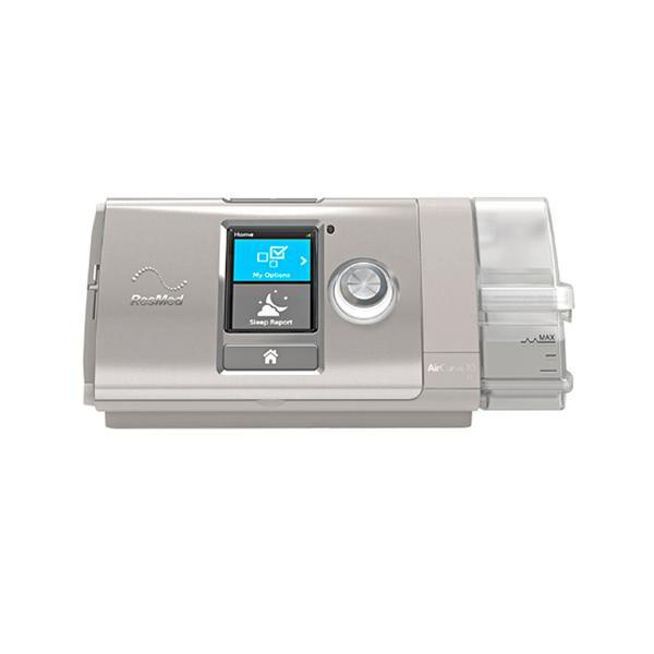 Silver rectangular machine with a clear attachment on the side.