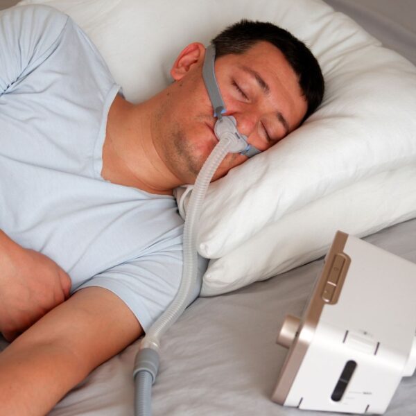 Man using CPAP machine